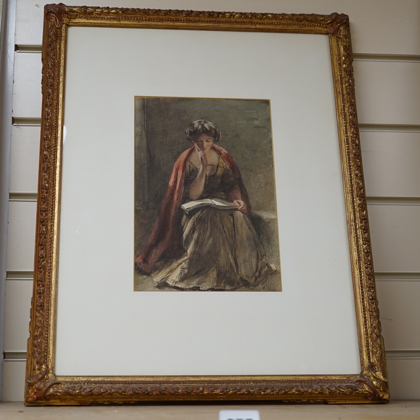 Late 19th century English School, Pre-Raphaelite watercolour, Seated girl reading, indistinctly monogrammed PFB?, 25 x 17cm. Condition - fair to good